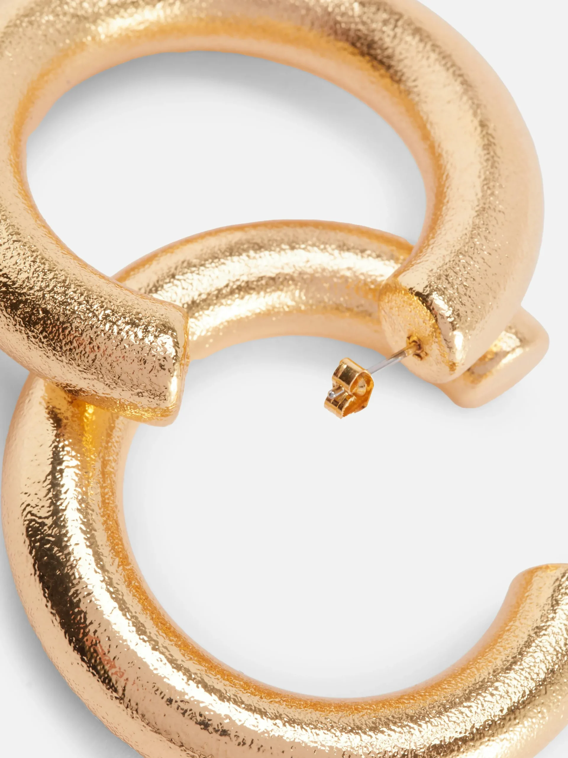 Große Creolen In Metallic-Optik