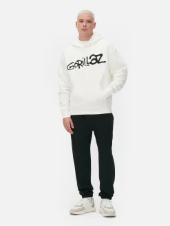 Hoodie Mit Tarnmuster Und „Gorillaz“ Grafik