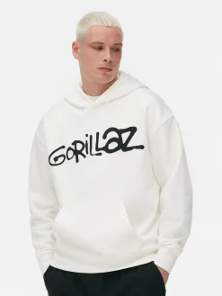Hoodie Mit Tarnmuster Und „Gorillaz“ Grafik