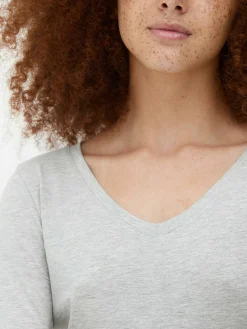 Langärmeliges Top Mit V-Ausschnitt