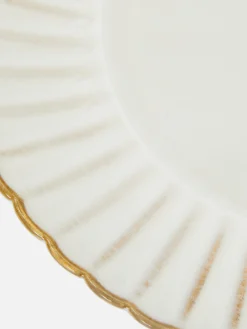 Muschelförmiger Beilagenteller