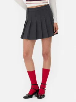 Plissierter „Rita Ora“ Minirock