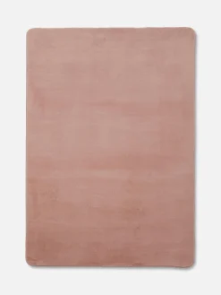 Rechteckiger Kunstfellteppich