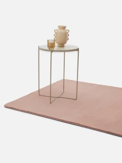 Rechteckiger Kunstfellteppich