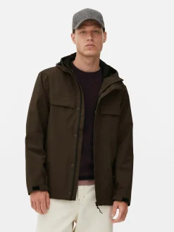 Regenmantel Mit Kapuze Und Durchgehendem Reißverschluss