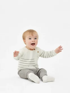 Set Aus Gestreiftem Strickpullover Und Leggings