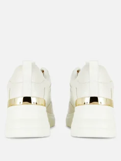 Sneaker Mit Keilabsatz Und Metallbesatz