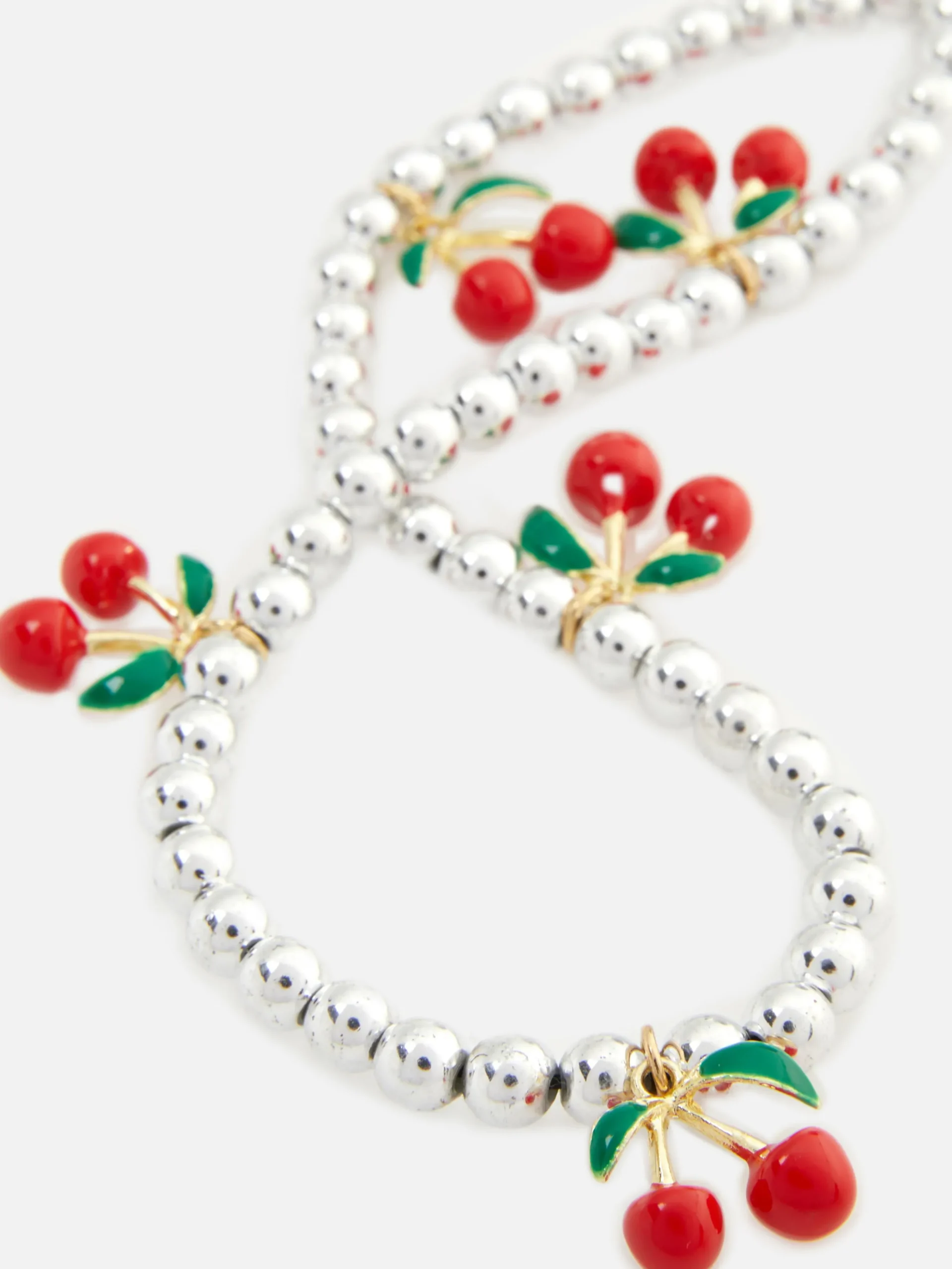 Telefonanhänger Mit Perlen In Kirschform Besetzt